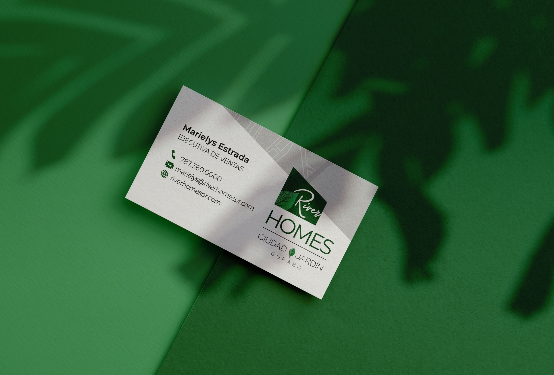 photo of a branded business card on top of a green background