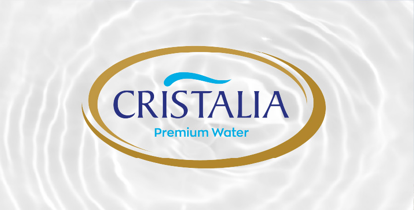 Cristalia logo on a white background with creme swirls
