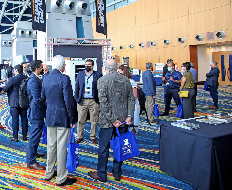 photo of attendees networking between conferences