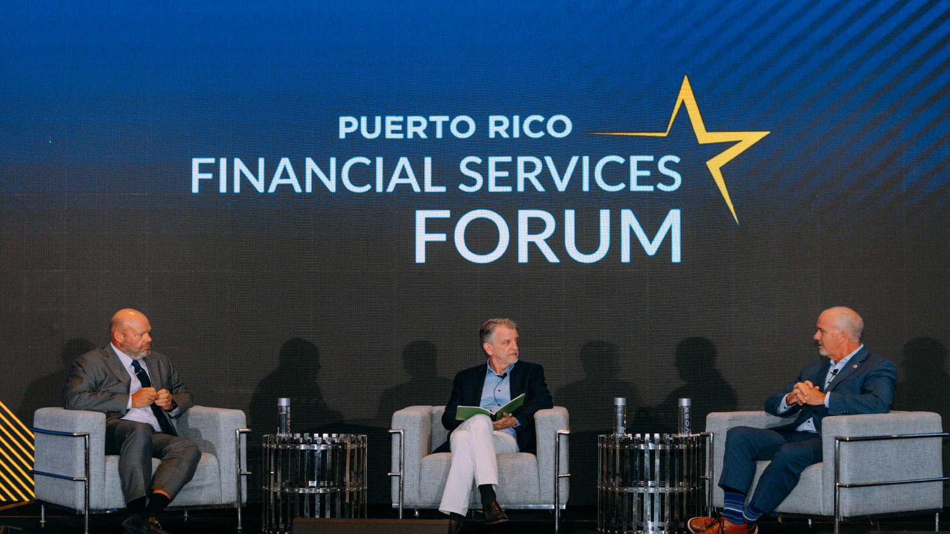 speakers on stage at the Financial Services Forum